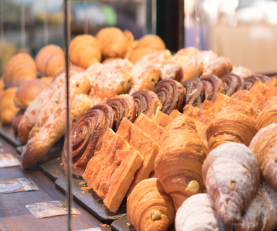 A beautiful display of various pastries arranged attractively in a cozy bakery in Lake Leelanau, MI